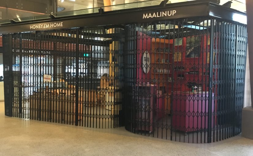 CURVED TRELLIS SECURITY DOORS SECURE TENANCIES WITHIN YAGAN SQUARE, PERTH