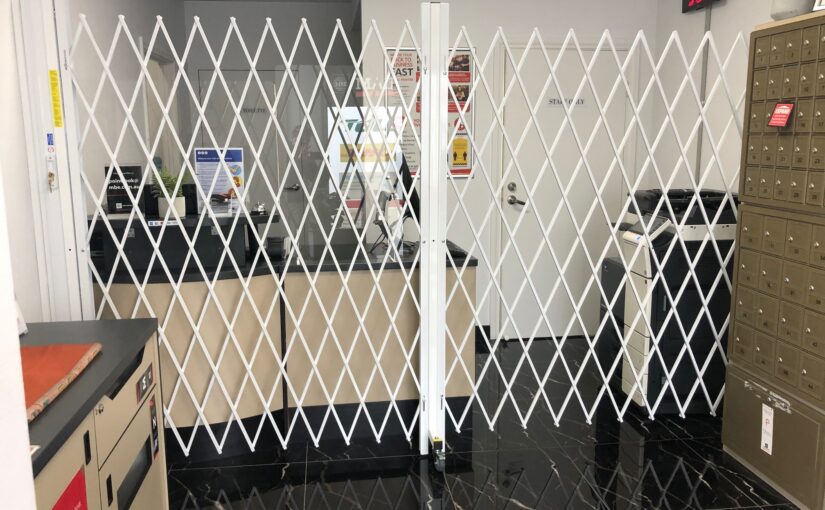 ROLL AND FOLDAWAY BARRIERS PROVIDE ACCESS CONTROL AT MAIL BOXES ETCETERA (MBE)