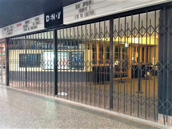 Shows expanding security screen over wide opening