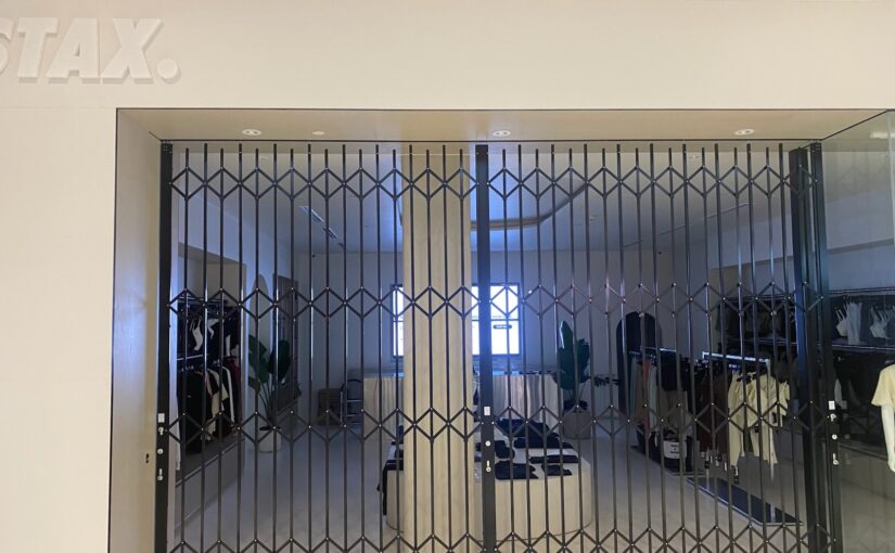 Minimalist designed commercial concertina doors for fashionable activewear retailer
