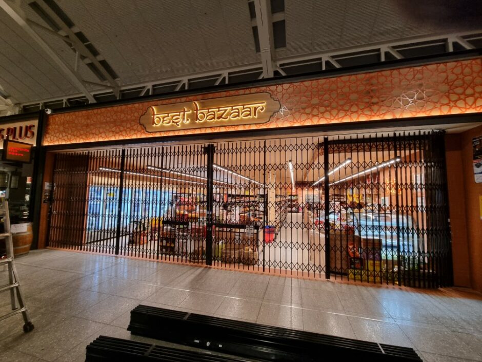 Folding Security Trellis Doors for Curved Shopfronts Australia