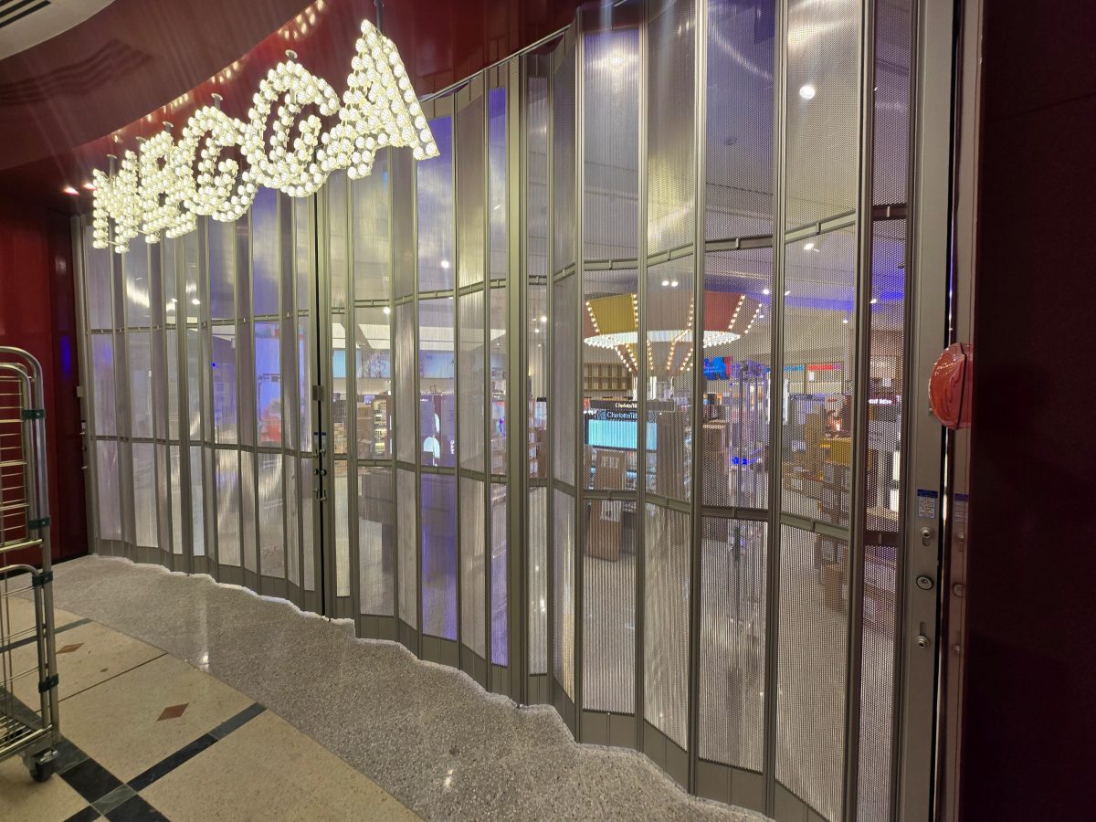 Spectacular Folding Closure Doors - Mecca Australia Storefront