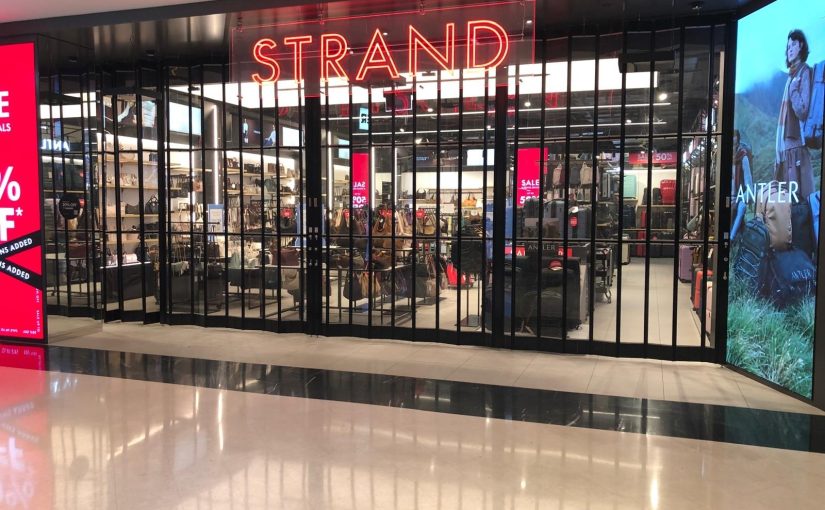 Standout commercial bifold folding closure doors.